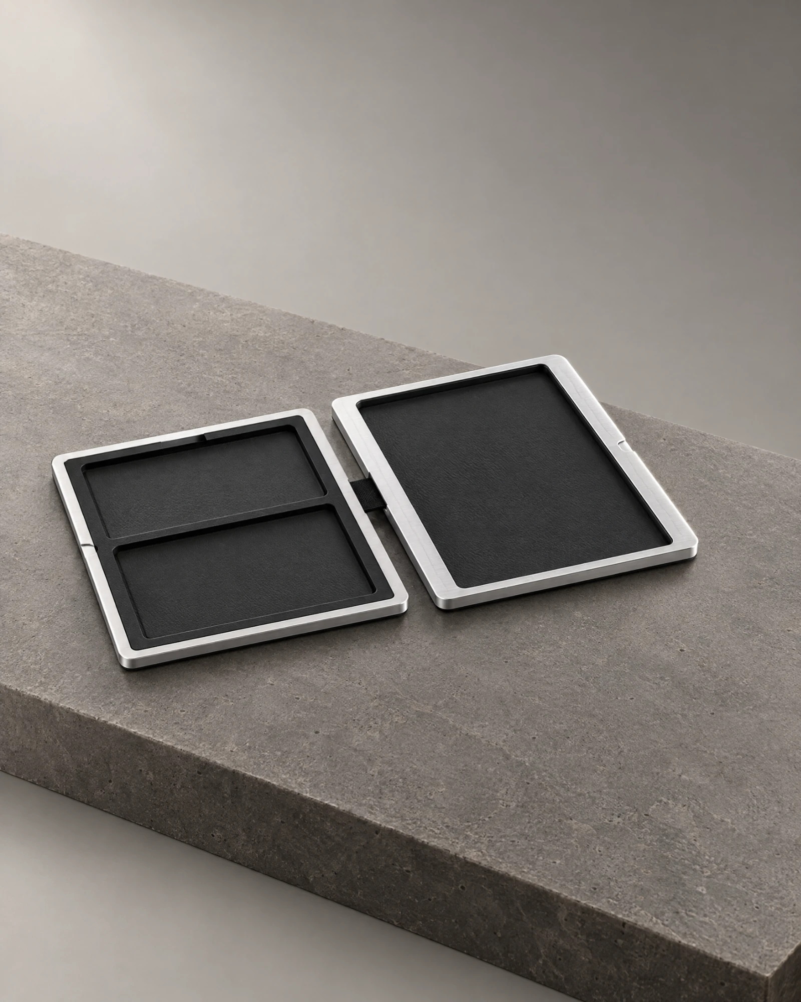 Finished open-product render showing black compartments and silver frames